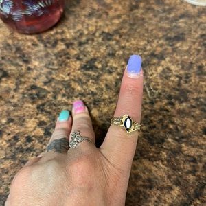 Gold blue sapphire ring with 2 rows of diamonds in n each side